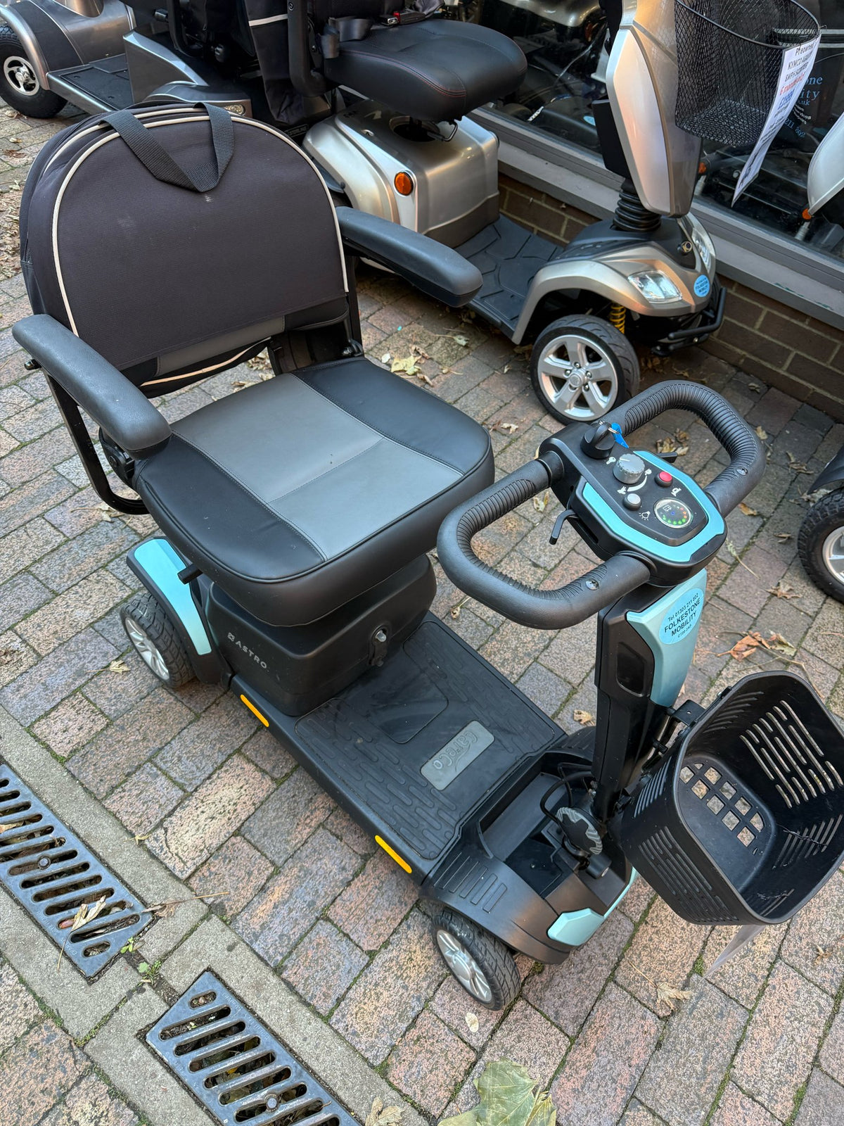 Pre-owned CareCo Astro 4mph boot scooter - side view