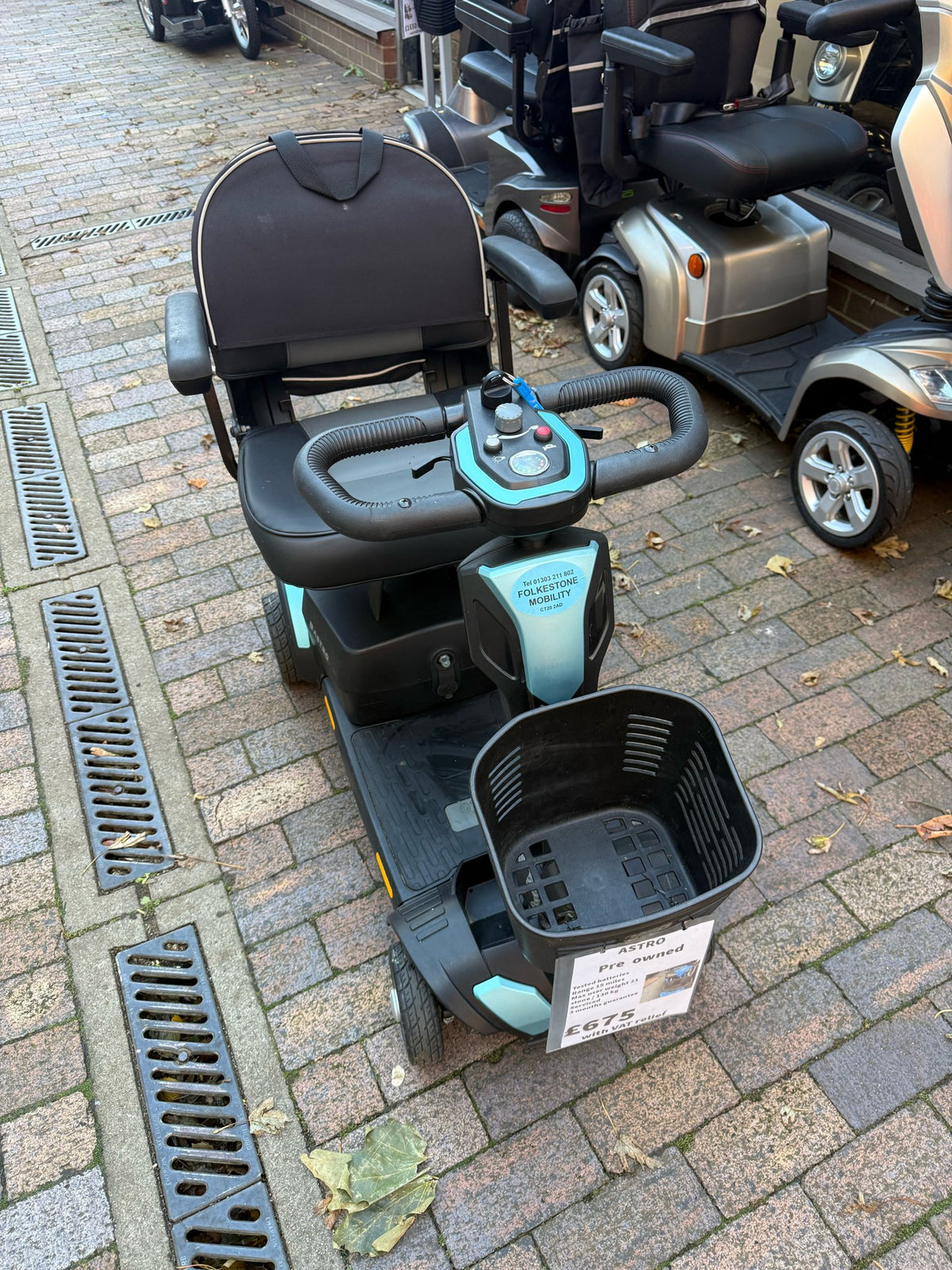 Pre-owned CareCo Astro 4mph boot scooter - front view