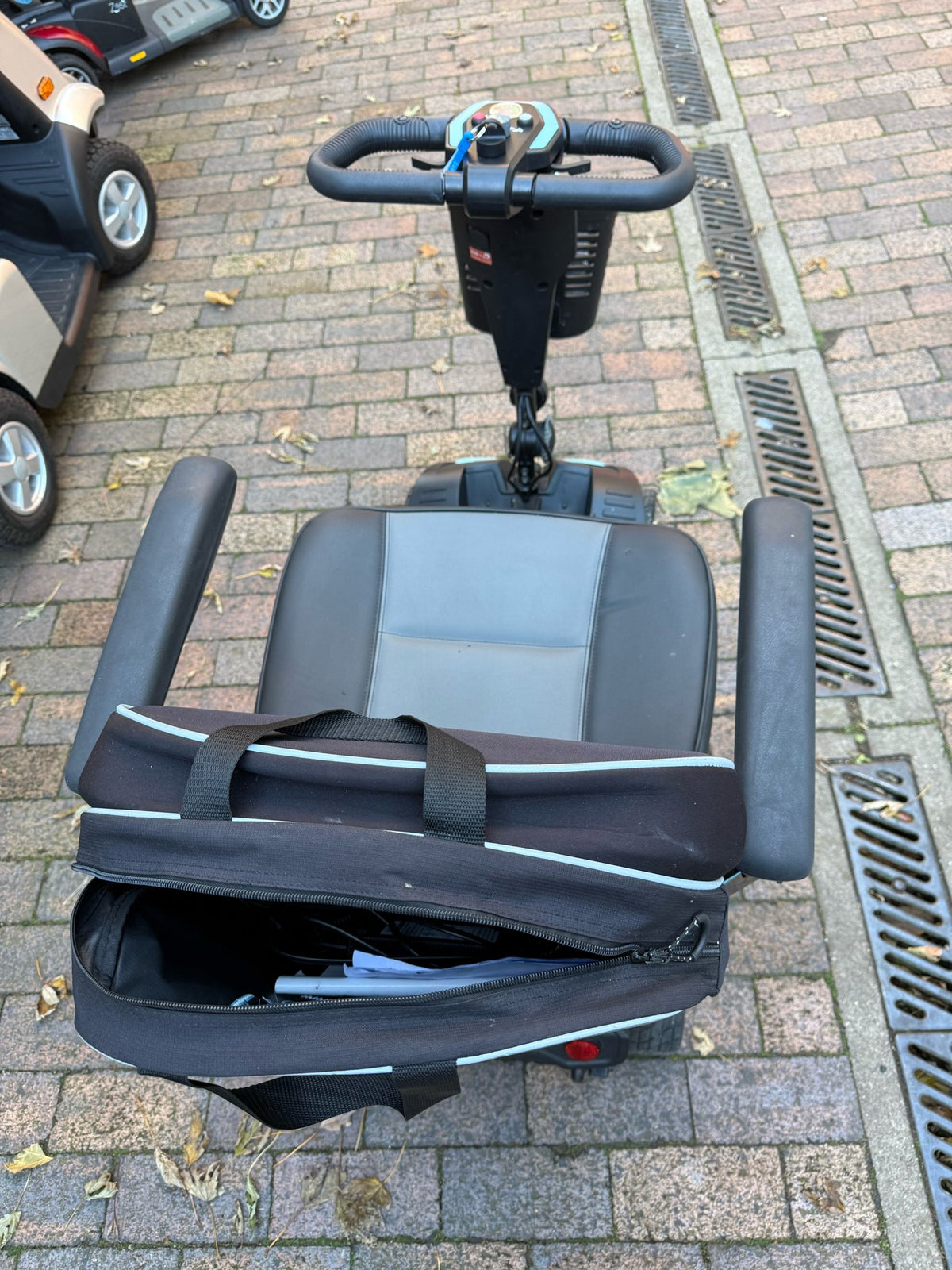 Pre-owned CareCo Astro 4mph boot scooter - top view with seat bag