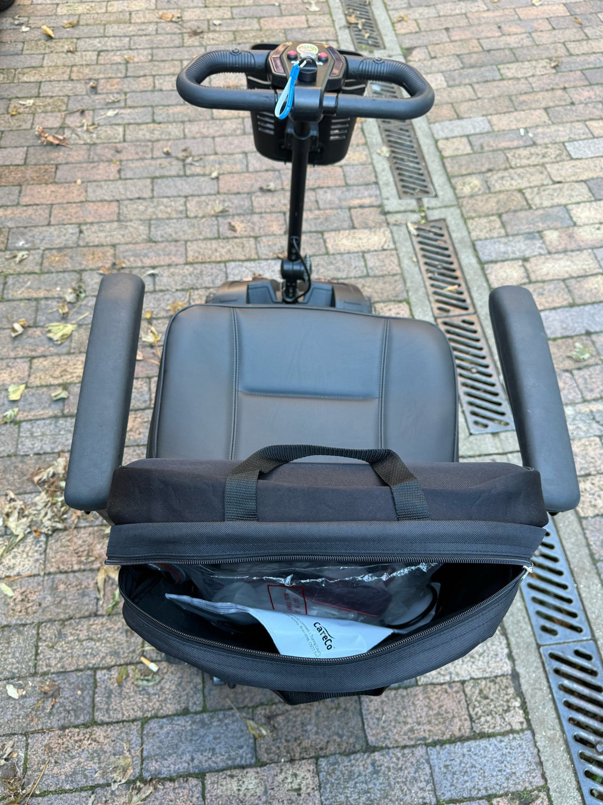 Pre-owned Cosmic 4mph boot scooter in blue - top view with seat bag