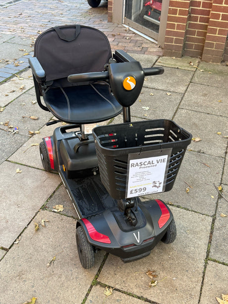 Pre-owned Rascal Vie 4mph boot scooter in red - front view