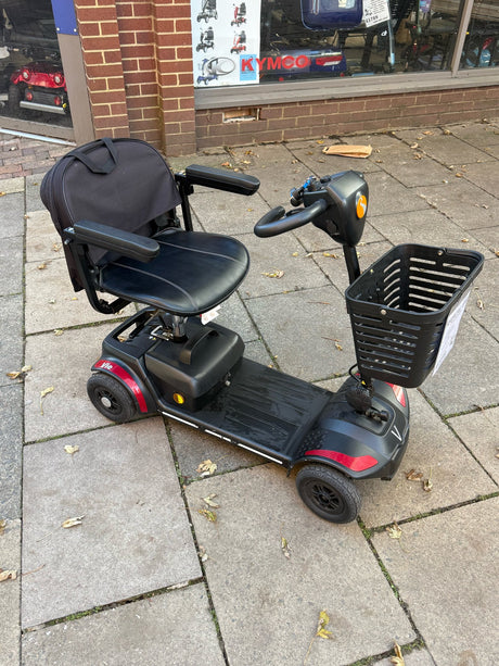 Pre-owned Rascal Vie 4mph boot scooter in red - side view