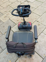 Pre-owned Rascal Vie 4mph boot scooter in red - top view of tiller and seat